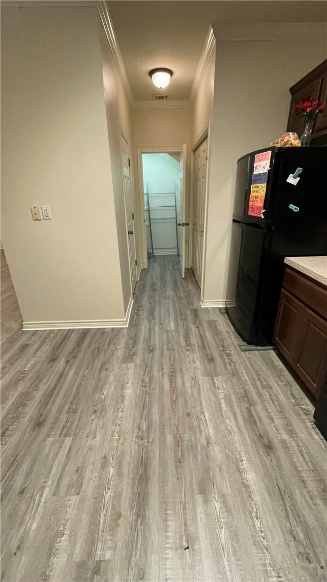 1425 West Villa Maria Road, Unit 602 Bryan, TX 77801 - Photo 18 of 41 a view of a room with wooden floor