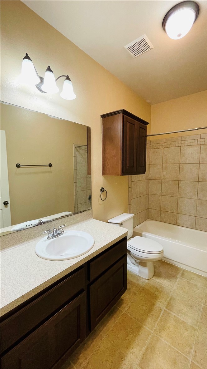 1425 West Villa Maria Road, Unit 602 Bryan, TX 77801 - Photo 24 of 41 a bathroom with a sink and a mirror