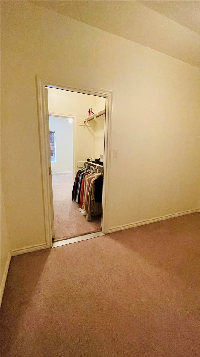 1425 West Villa Maria Road, Unit 602 Bryan, TX 77801 - Photo 30 of 41 a view of a room with closet