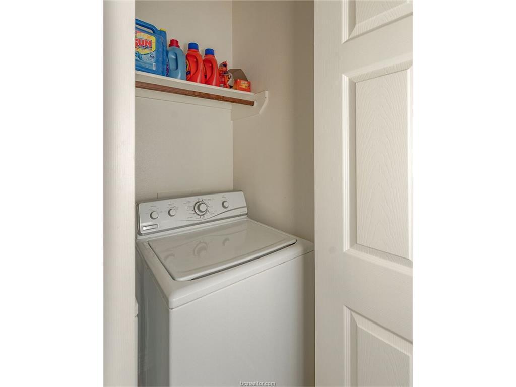 1425 West Villa Maria Road, Unit 602 Bryan, TX 77801 - Photo 4 of 12 a utility room with dryer and washer