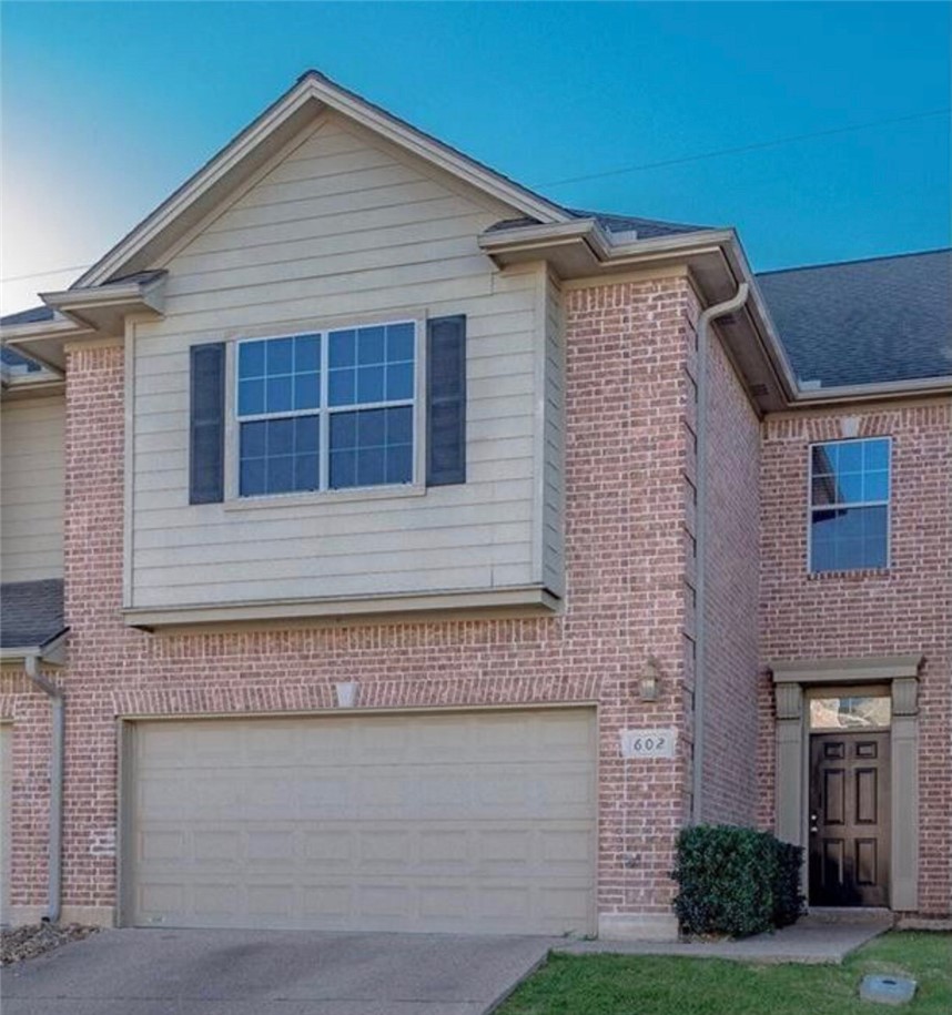 1425 West Villa Maria Road, Unit 602 Bryan, TX 77801 - Photo 41 of 41 a front view of a house with a yard