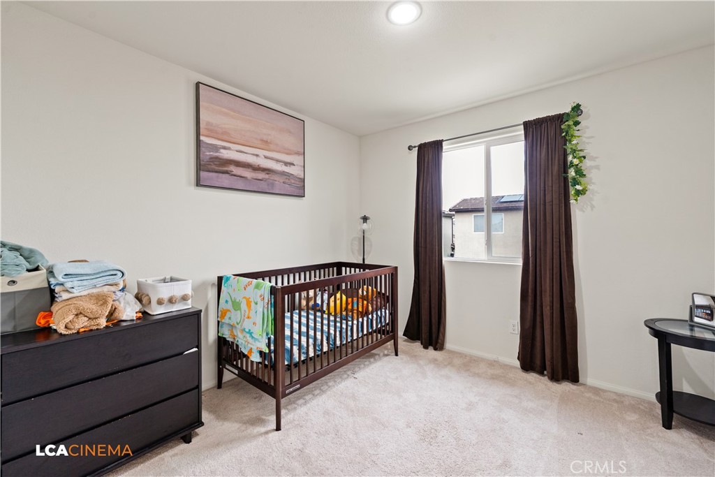 11112 Pasto Way Bakersfield, CA 93306 - Photo 19 of 35 a bedroom with furniture and a window