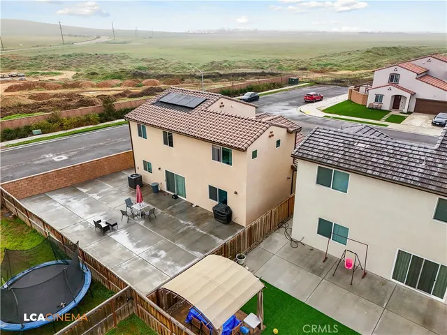 a view of a city with lawn chairs