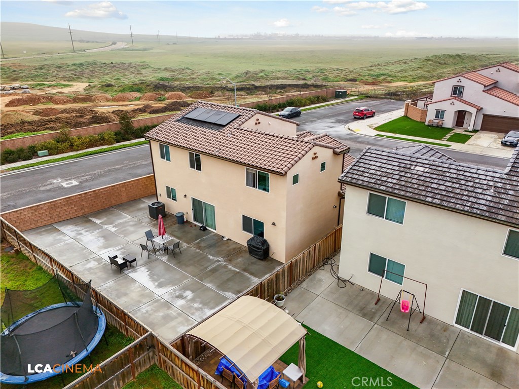 11112 Pasto Way Bakersfield, CA 93306 - Photo 27 of 35 a view of a patio with lawn chairs next to an ocean