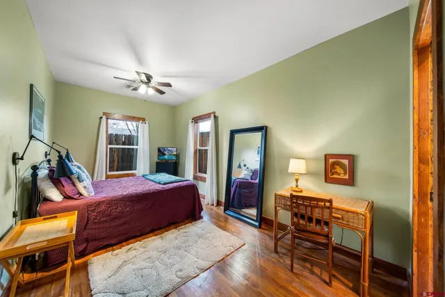 a bed room with a bed and furniture