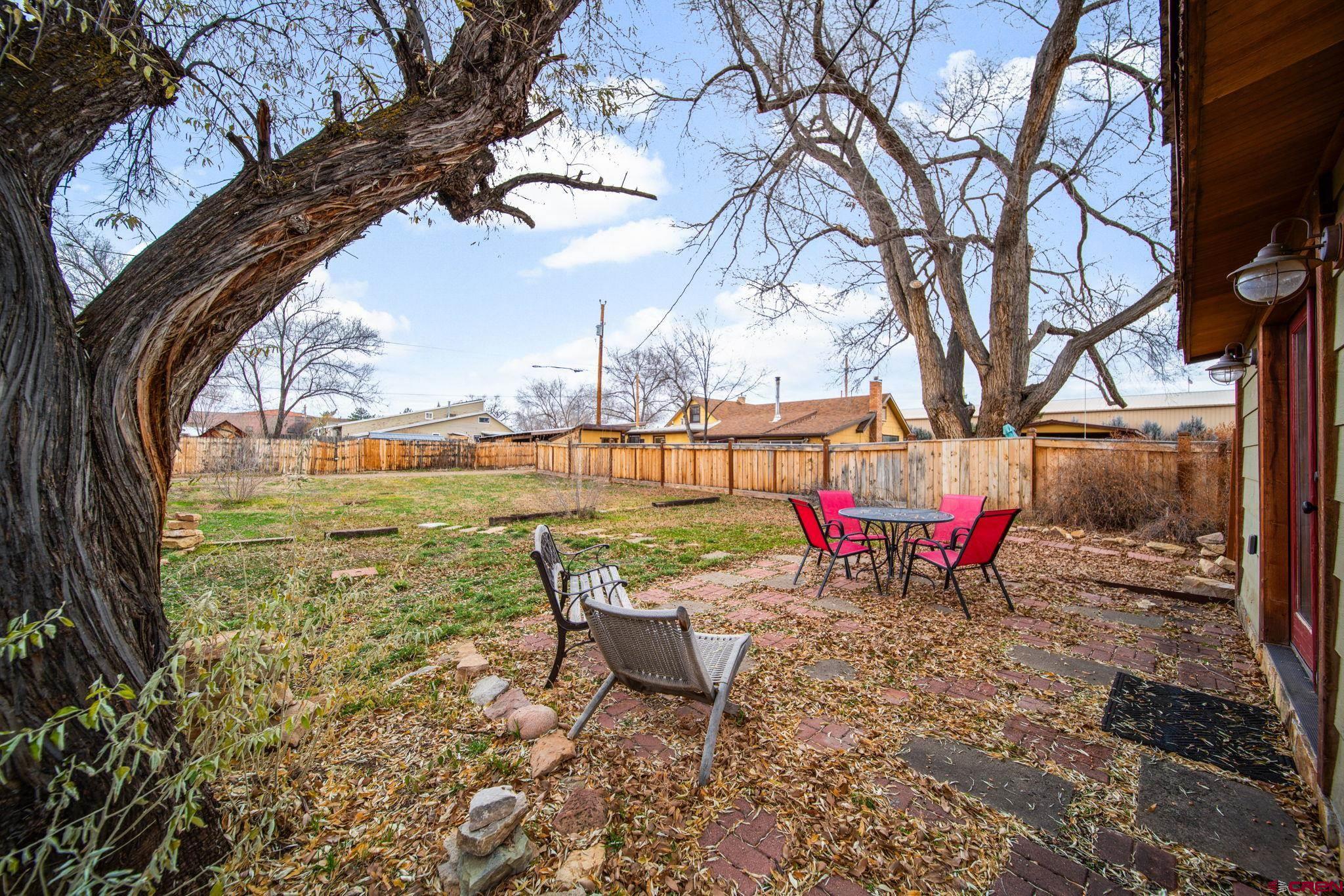 115 South Linden Street Cortez, CO 81321 - Photo 26 of 30 a view of a lake with a sitting area and a lake view