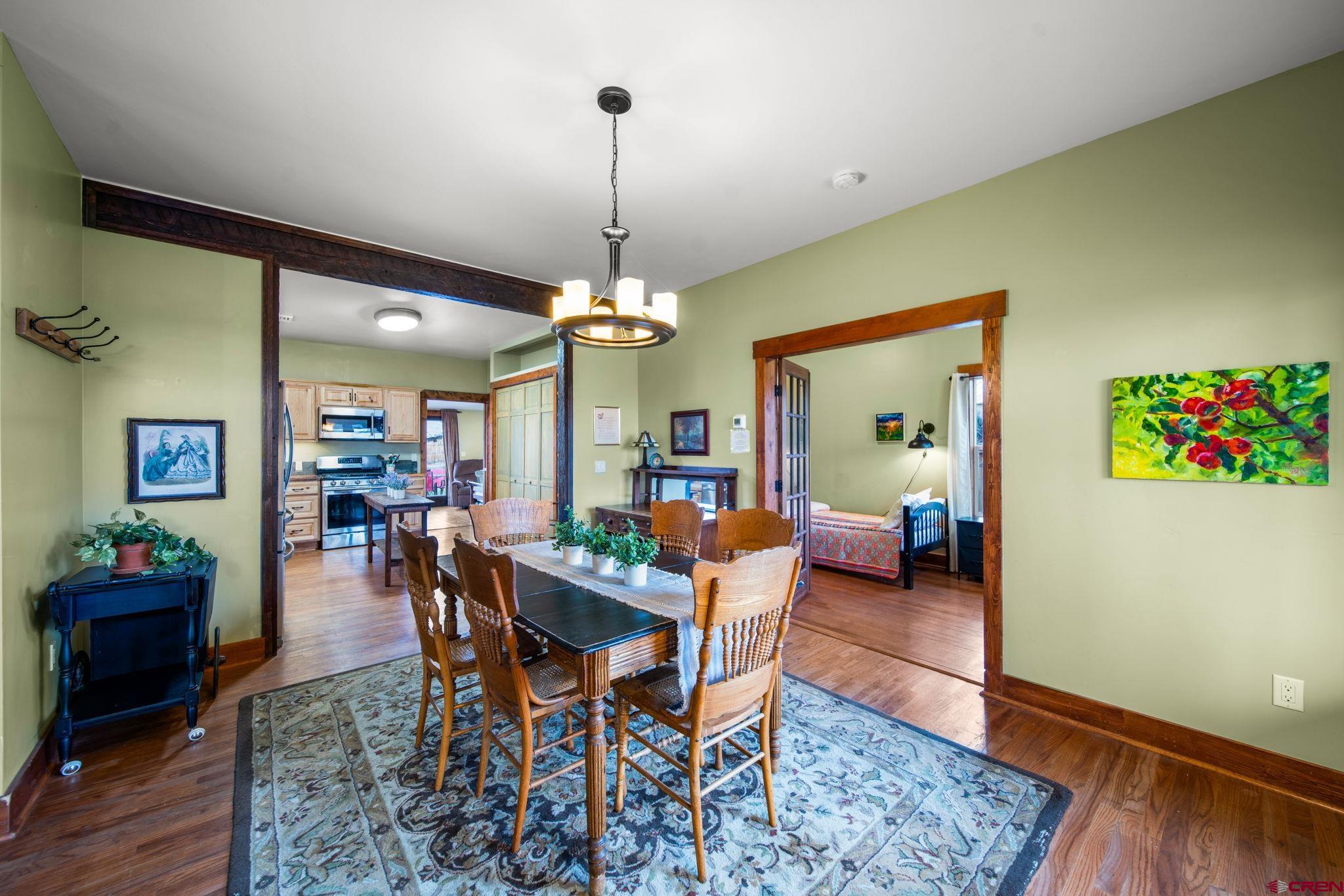 115 South Linden Street Cortez, CO 81321 - Photo 4 of 30 a view of a dining room with furniture and wooden floor