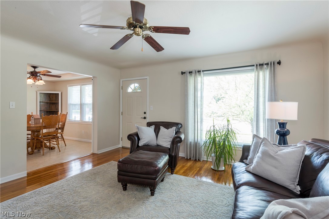 13175 McCracken Road Cleveland, OH 44125 - Photo 4 of 48 Living room featuring hardwoodwood floors and ceiling fan