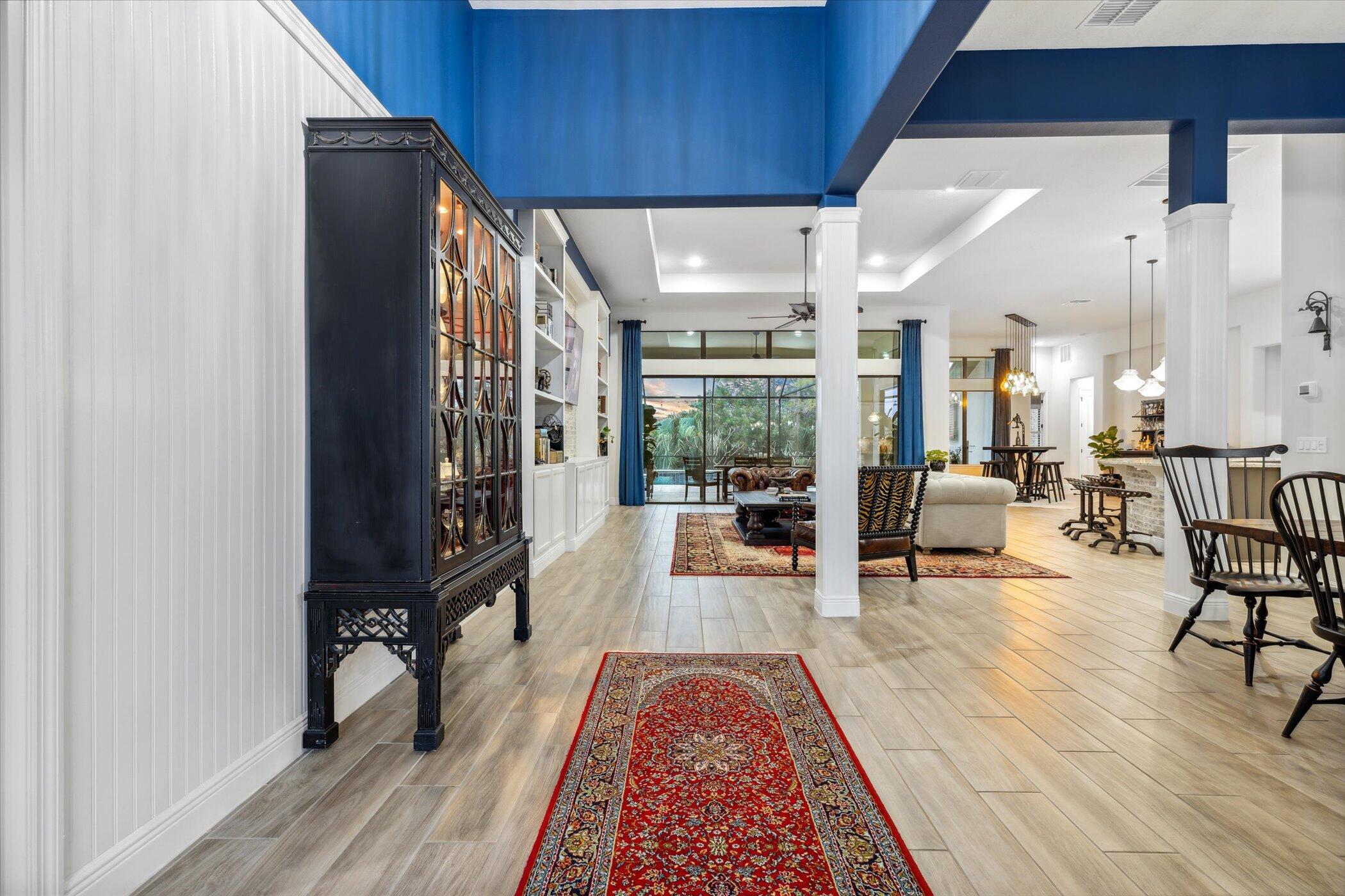 5420 Calder Drive Melbourne, FL 32940 - Photo 11 of 73 a living room with furniture rug and wooden floor