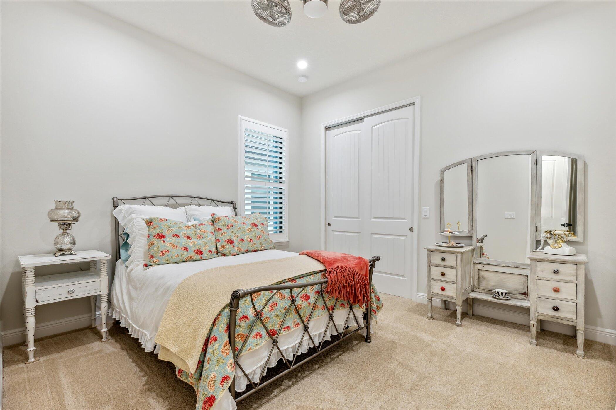 5420 Calder Drive Melbourne, FL 32940 - Photo 35 of 73 a bedroom with a bed a table and chair