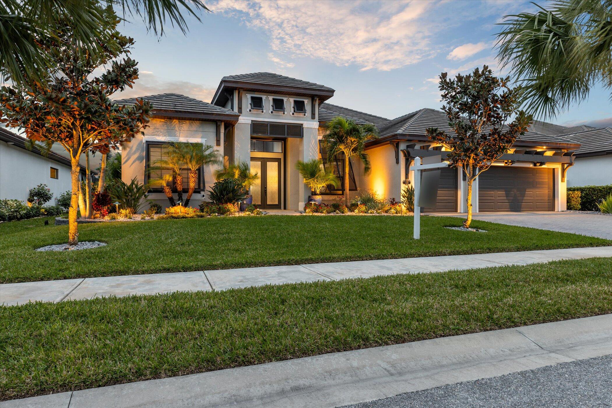 5420 Calder Drive Melbourne, FL 32940 - Photo 4 of 73 a front view of a house with a yard
