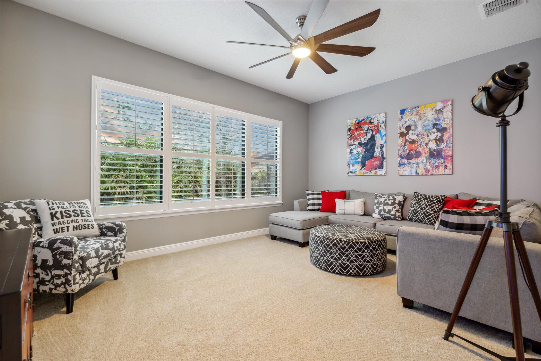 5420 Calder Drive Melbourne, FL 32940 - Photo 54 of 73 a living room with furniture and a window