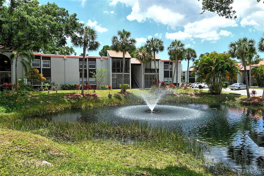3201 South Beneva Road, Unit 204 Sarasota, FL 34232 - Photo 29 of 34 a view of a lake with houses
