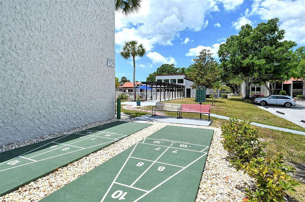 3201 South Beneva Road, Unit 204 Sarasota, FL 34232 - Photo 33 of 34 a view of yard with swimming pool and seating space