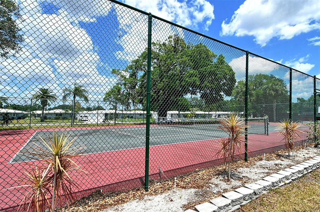 3201 South Beneva Road, Unit 204 Sarasota, FL 34232 - Photo 34 of 34 a view of a park with iron fence