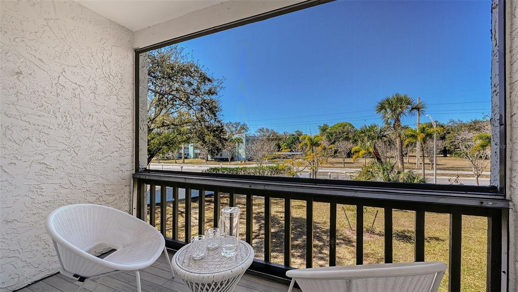 3201 South Beneva Road, Unit 204 Sarasota, FL 34232 - Photo 5 of 34 a view of a balcony with chairs