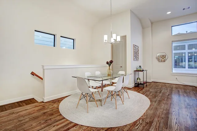 a kitchen with a sink a counter top space and stainless steel appliances