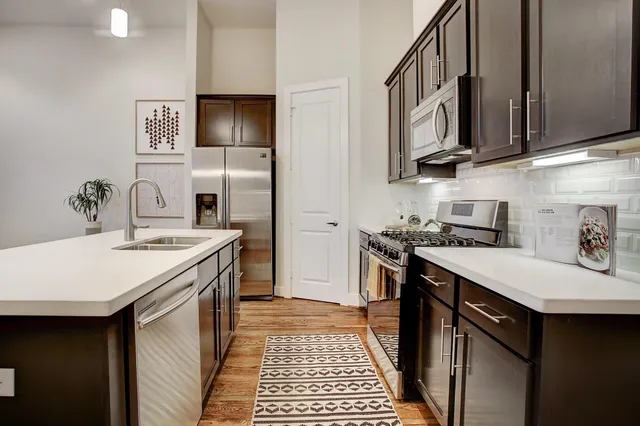a view of an empty room and closet area