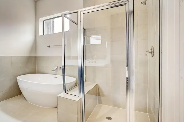 a bed room with a bed and a chandelier