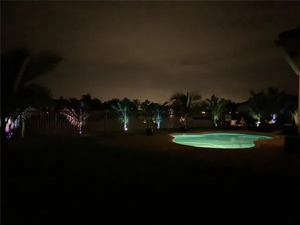 a view of a golf course with a lake