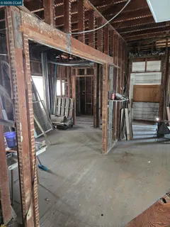 a view of a house with wooden floor and stairs