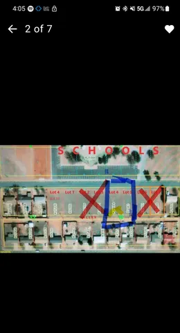 a view of an outdoor space and tennis court