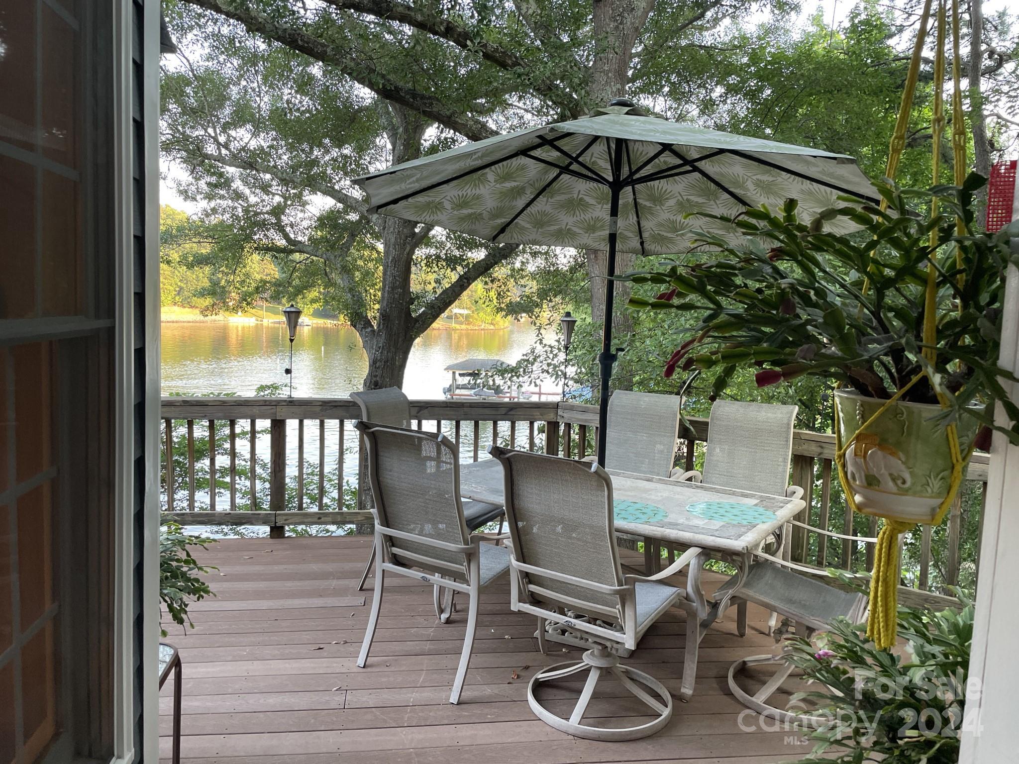 936 Rocky Point Lane Tega Cay, SC 29708 - Photo 12 of 48 a view of chair and tables in the balcony