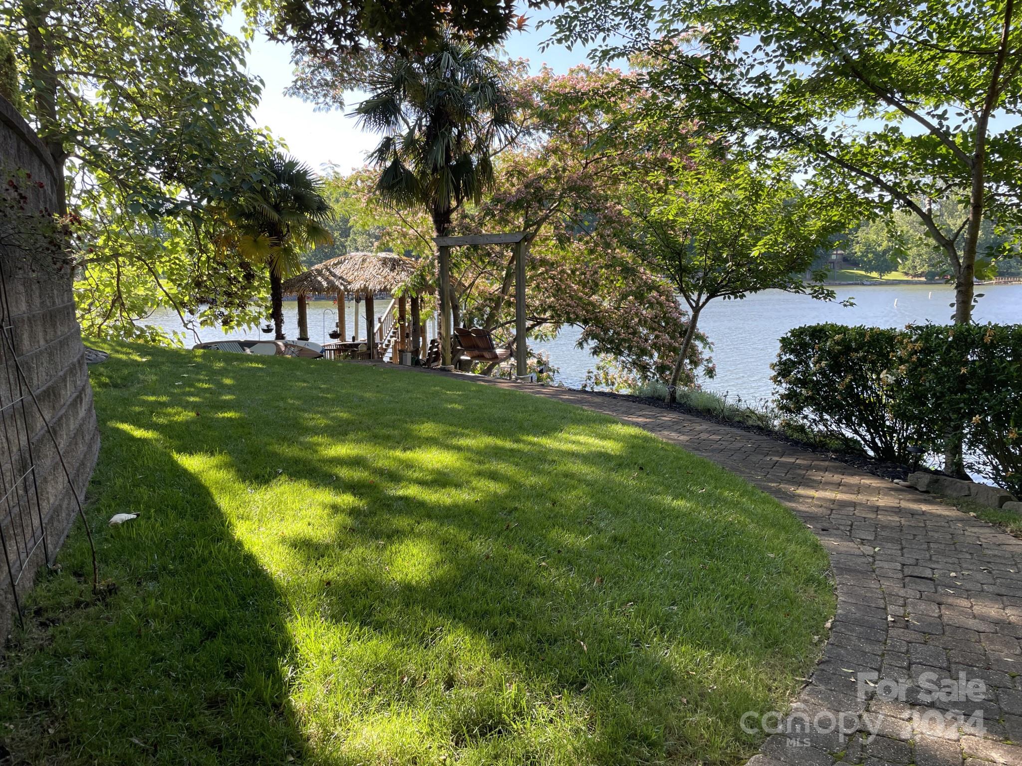 936 Rocky Point Lane Tega Cay, SC 29708 - Photo 17 of 48 a view of a trees with a yard