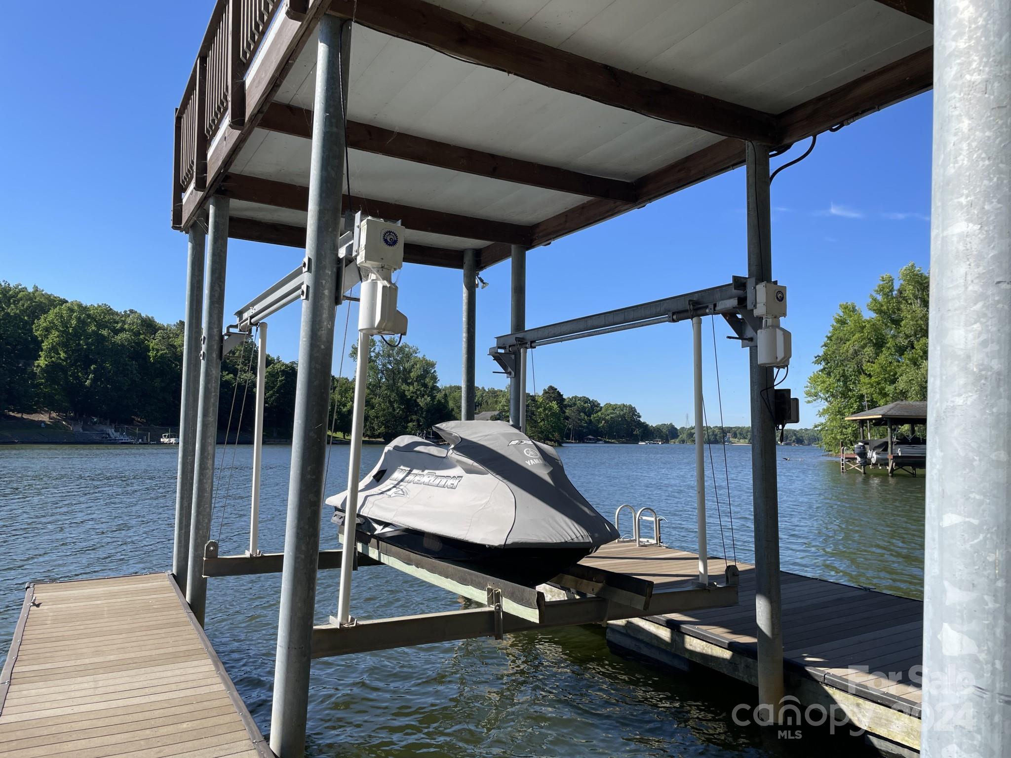 936 Rocky Point Lane Tega Cay, SC 29708 - Photo 24 of 48 a view of balcony with wooden floor and outdoor seating