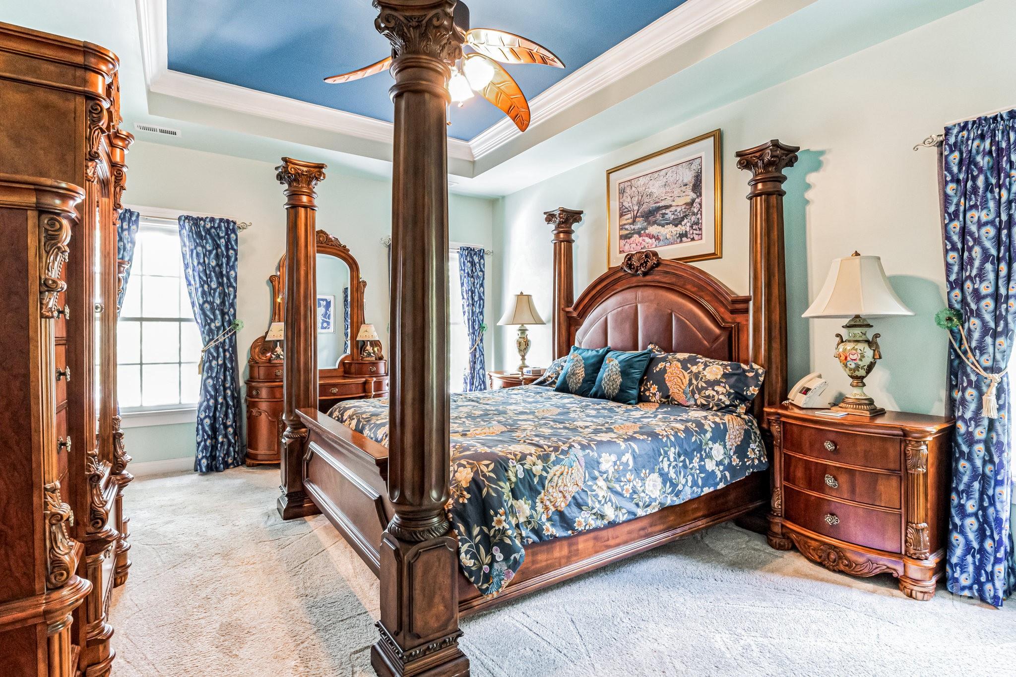 936 Rocky Point Lane Tega Cay, SC 29708 - Photo 30 of 48 a bedroom with a bed and a painting on the wall