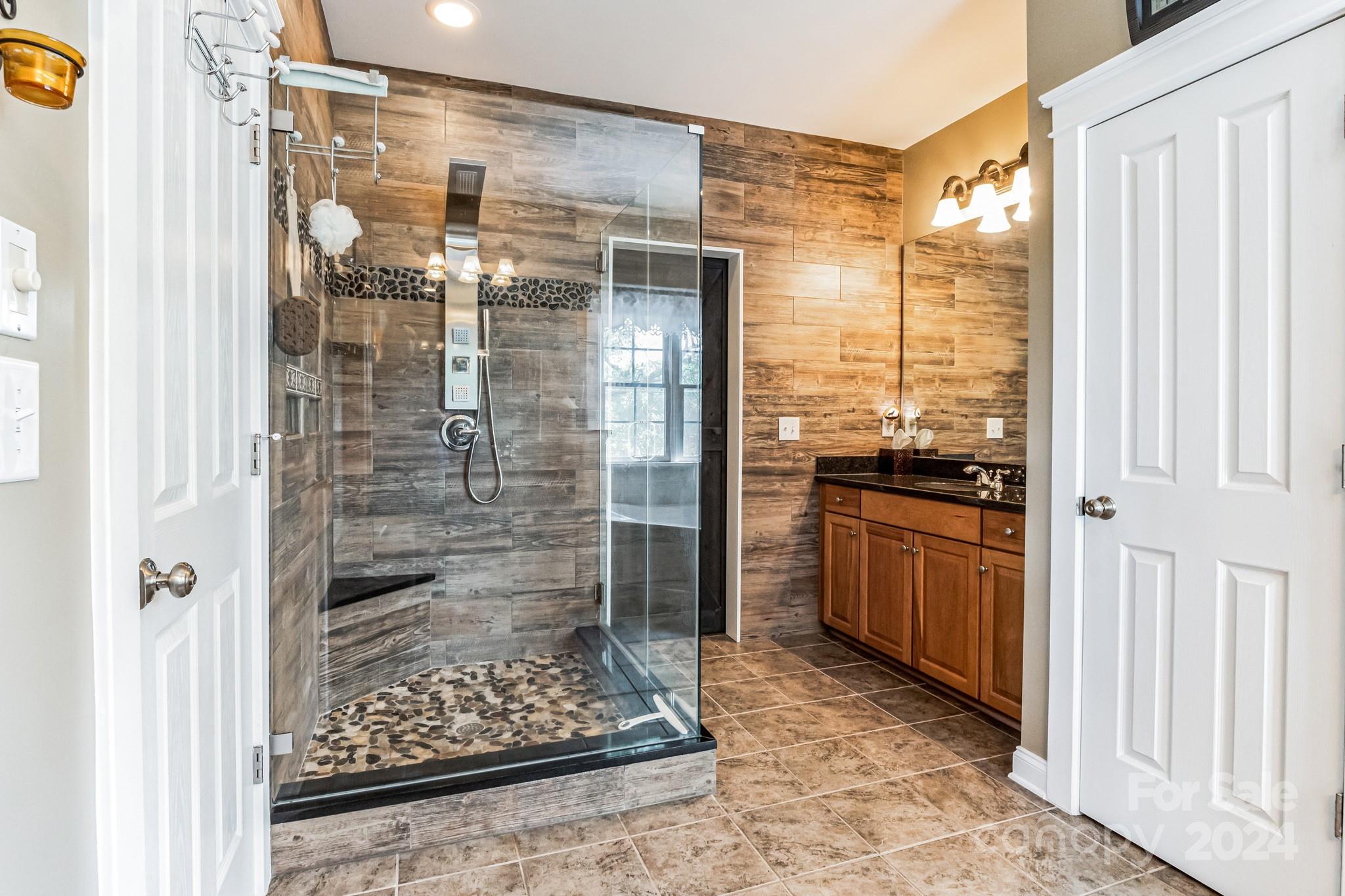 936 Rocky Point Lane Tega Cay, SC 29708 - Photo 31 of 48 a bathroom with a shower