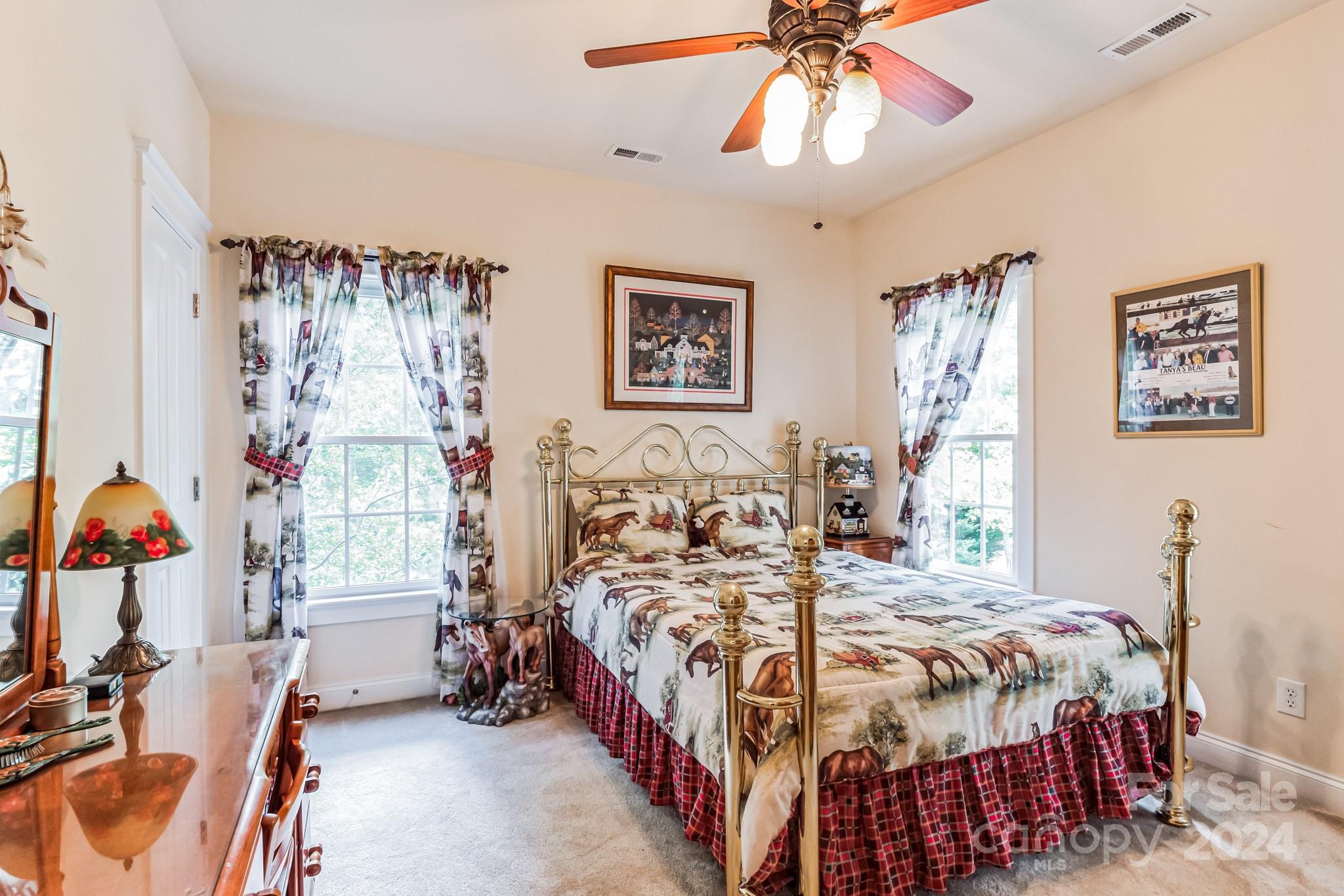 936 Rocky Point Lane Tega Cay, SC 29708 - Photo 33 of 48 a bedroom with bed and a window