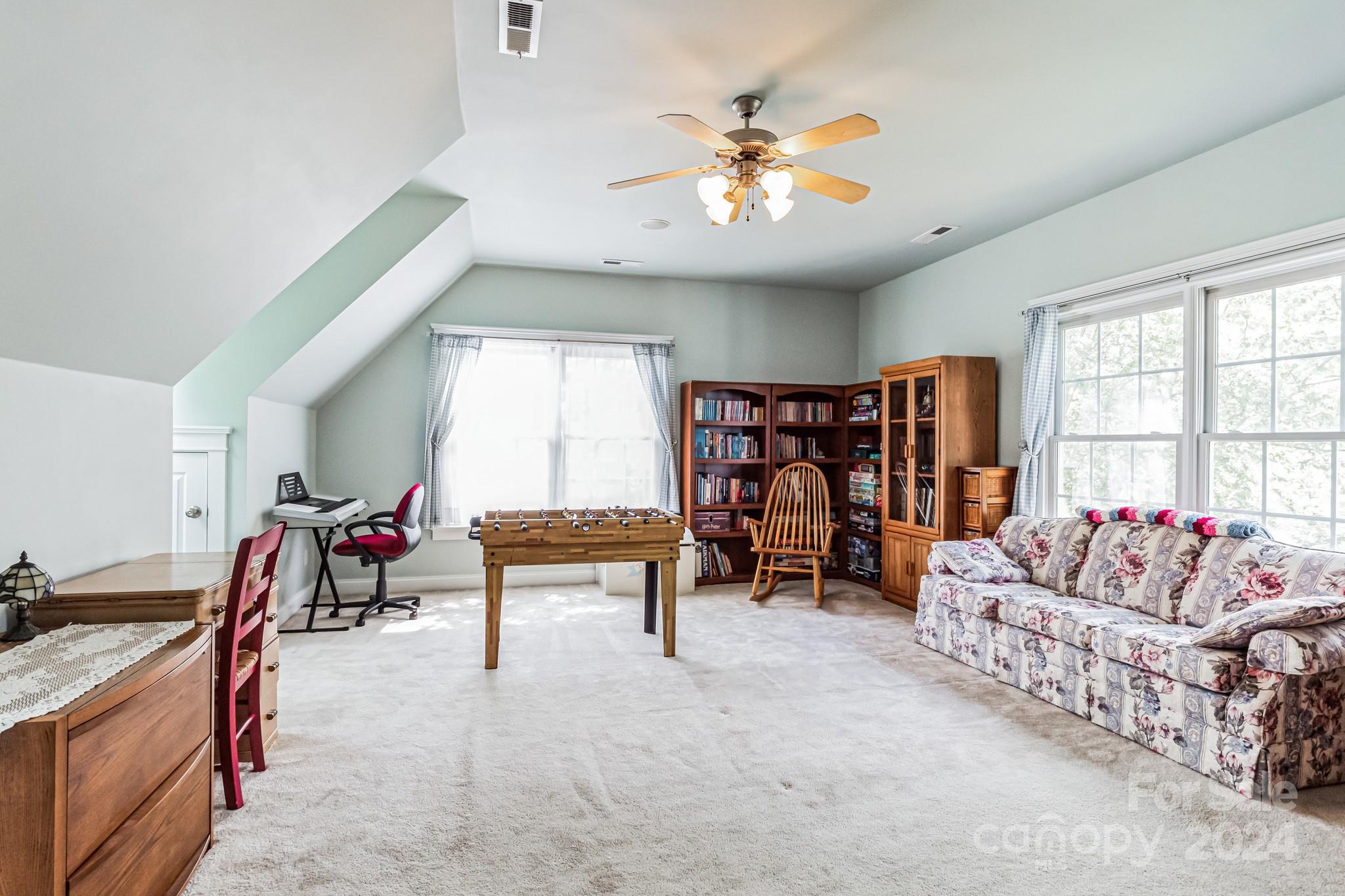 936 Rocky Point Lane Tega Cay, SC 29708 - Photo 37 of 48 a living room with furniture and white walls