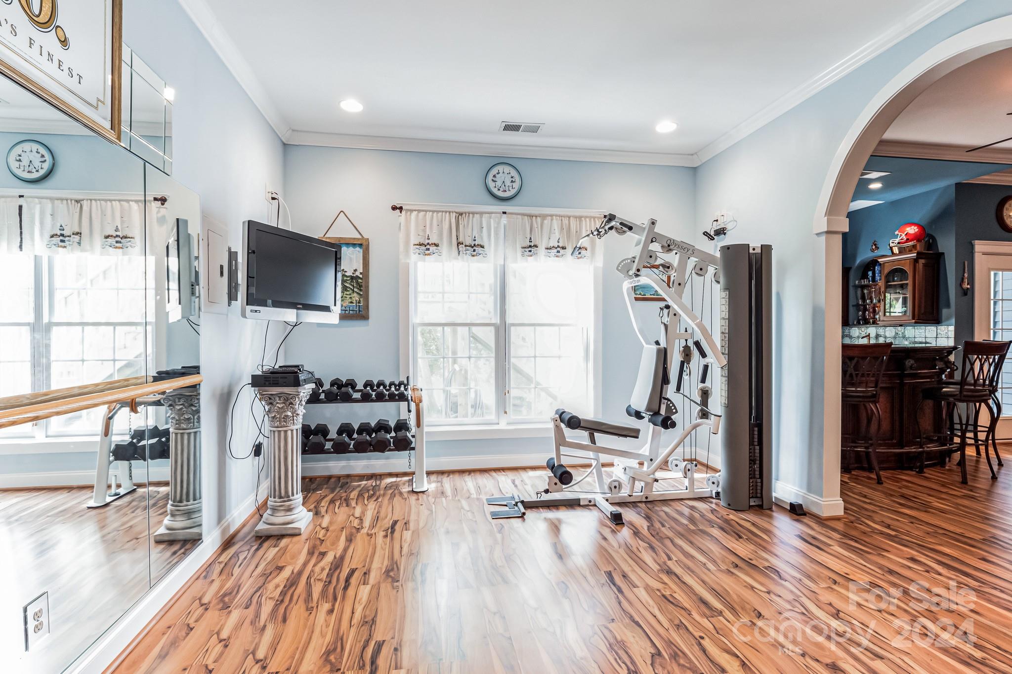 936 Rocky Point Lane Tega Cay, SC 29708 - Photo 48 of 48 a view of a living room with kitchen appliances and wooden floor