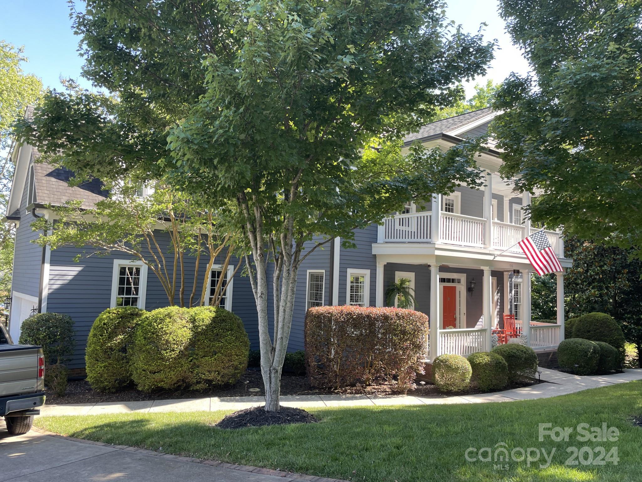 936 Rocky Point Lane Tega Cay, SC 29708 - Photo 8 of 48 a view of a house with a yard and plants
