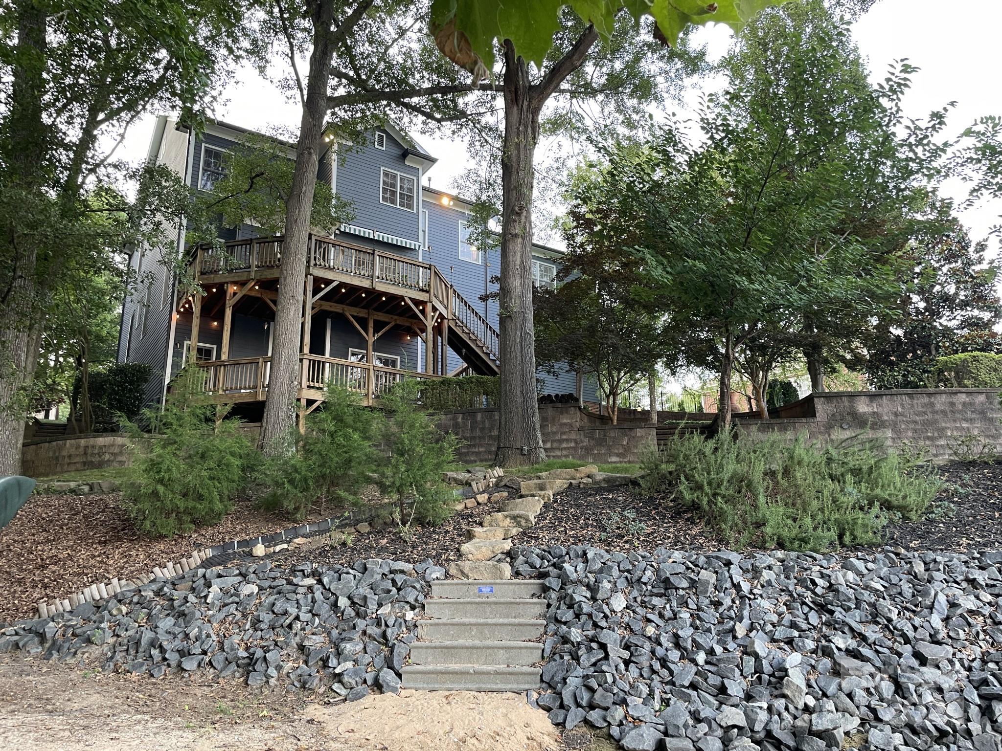 936 Rocky Point Lane Tega Cay, SC 29708 - Photo 10 of 48 a front view of a house with a yard