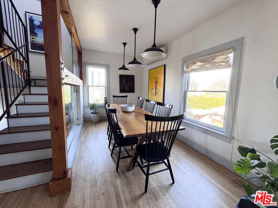 814 East Edgeware Road Los Angeles, CA 90026 - Photo 12 of 33 a view of a dining room with furniture window and wooden floor