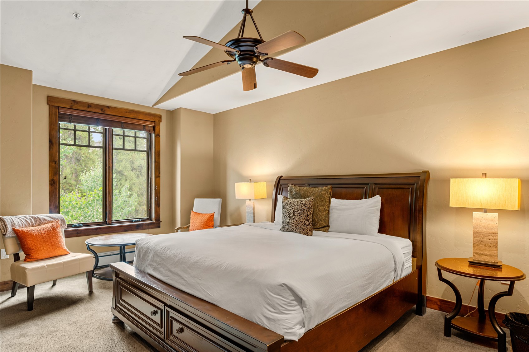 600 Columbine Road, Unit 5310 Breckenridge, CO 80424 - Photo 12 of 38 a bedroom with a bed and a chandelier