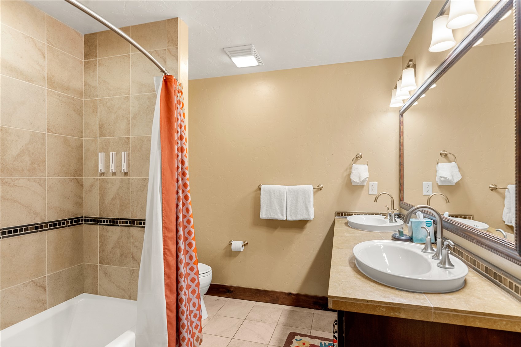 600 Columbine Road, Unit 5310 Breckenridge, CO 80424 - Photo 19 of 38 a bathroom with a sink and a mirror