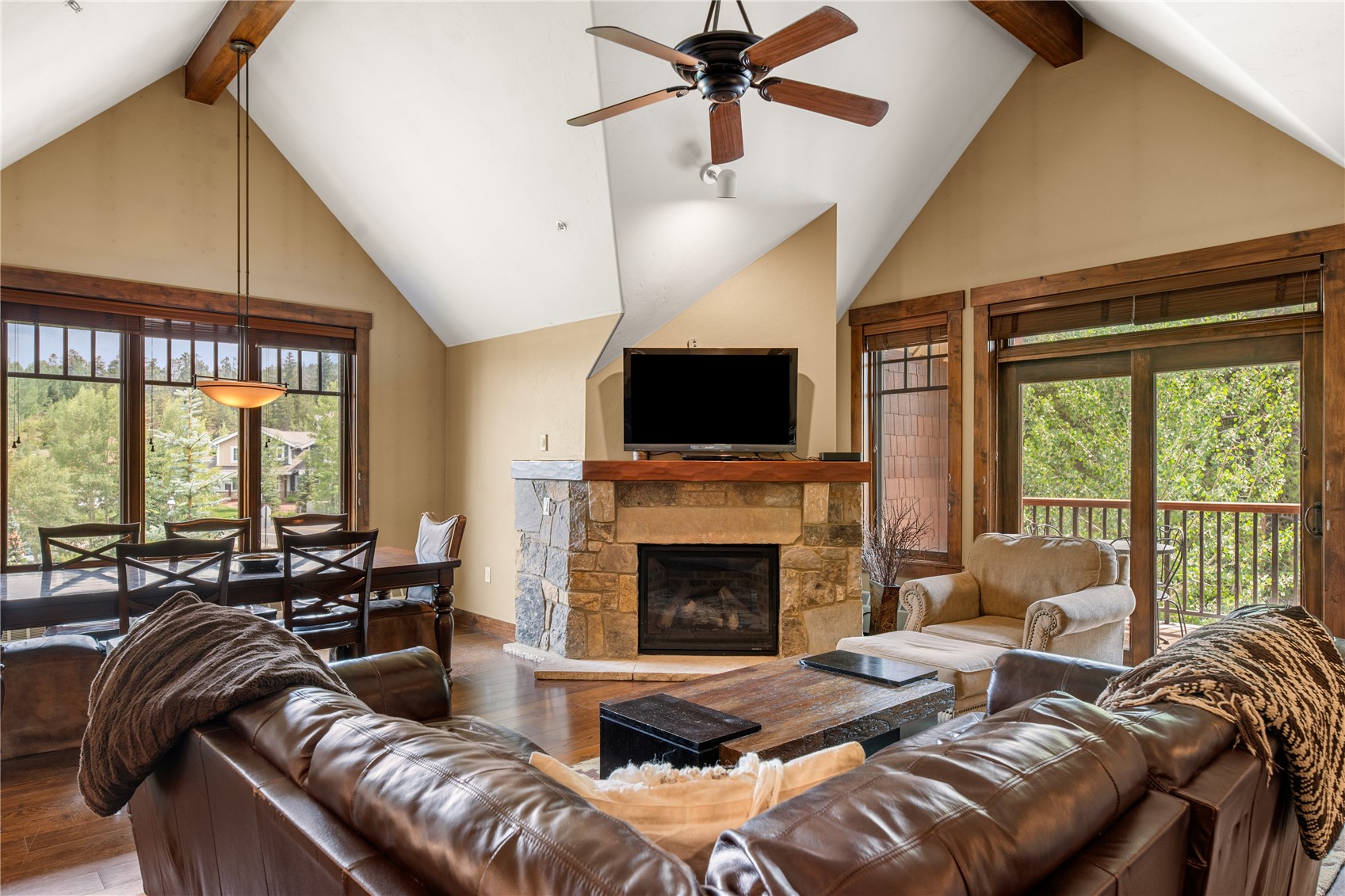 600 Columbine Road, Unit 5310 Breckenridge, CO 80424 - Photo 3 of 38 a living room with furniture fireplace and a large window