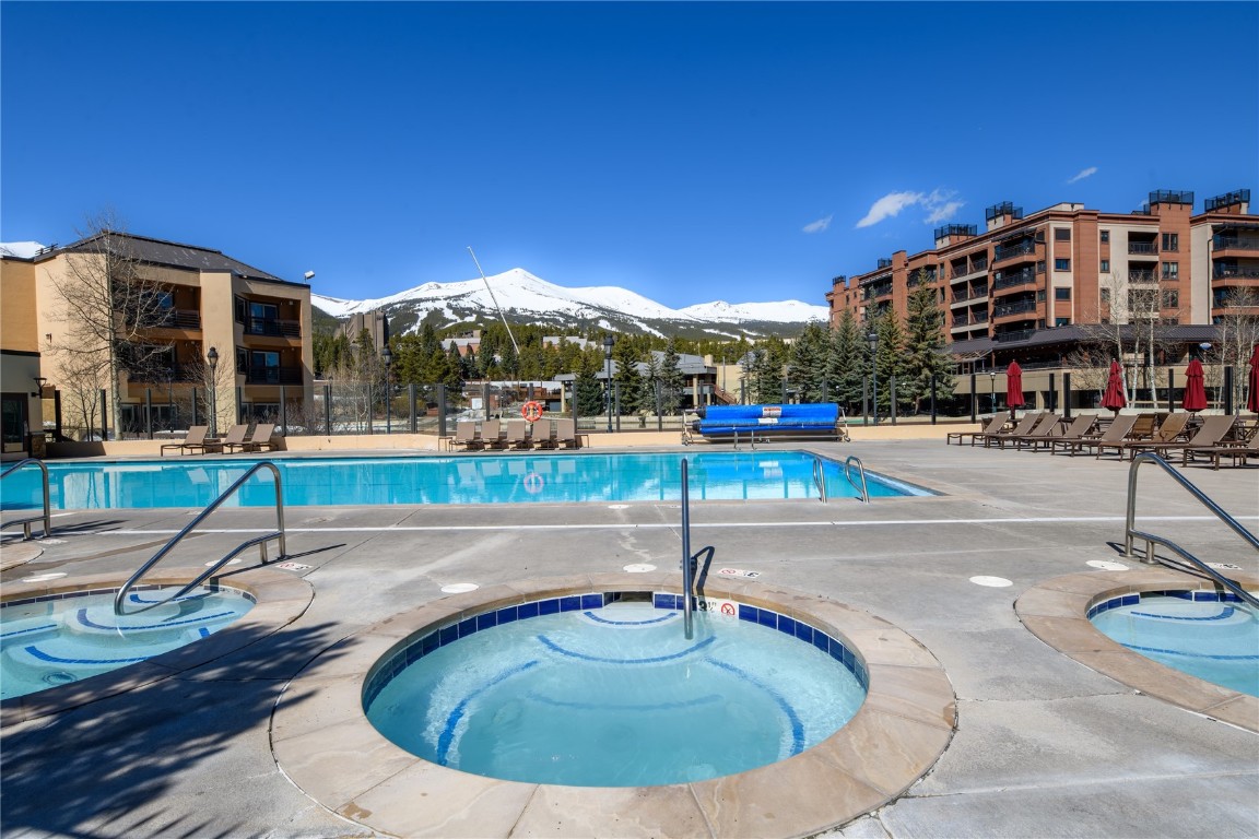600 Columbine Road, Unit 5310 Breckenridge, CO 80424 - Photo 34 of 38 a view of a swimming pool with a sitting space