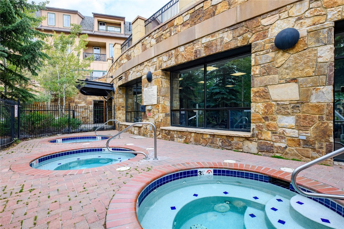 600 Columbine Road, Unit 5310 Breckenridge, CO 80424 - Photo 36 of 38 a front view of a house with swimming pool