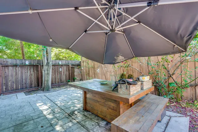 a kitchen with a sink cabinets and appliances