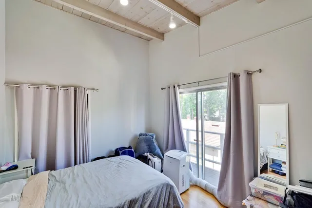 a bathroom with a sink a mirror and a bathtub