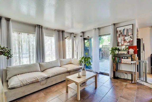 a kitchen with a stove and a sink