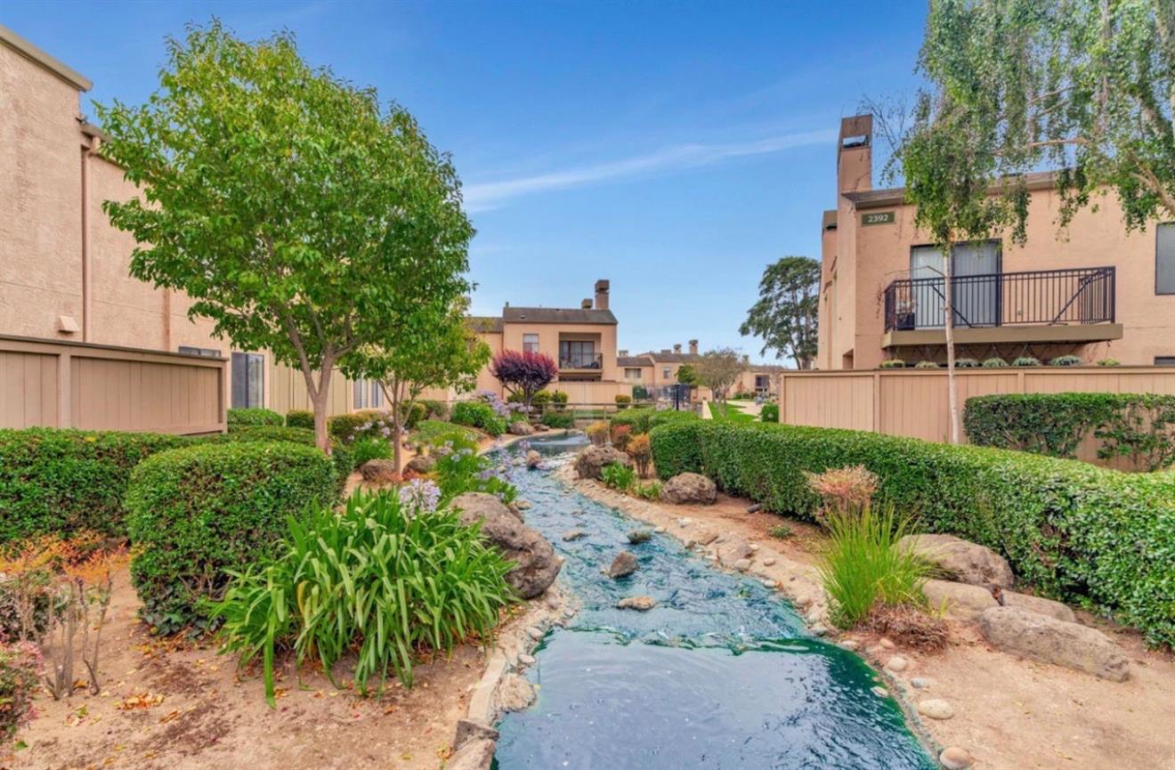 2416 North Main Street, Unit H Salinas, CA 93906 - Photo 1 of 1 an aerial view of a house with a yard and garden