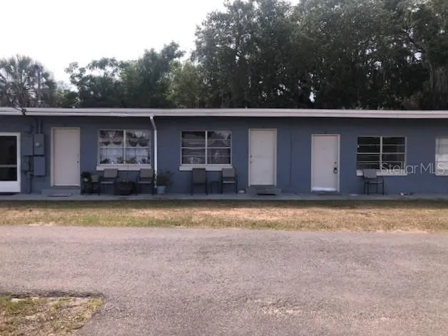 a view of outdoor space yard and swimming pool