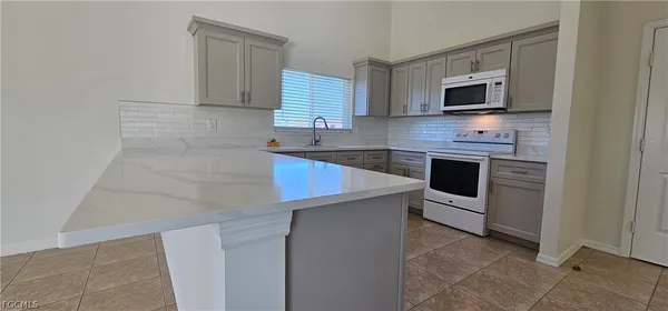 $1,950 | 420 Southeast 15th Terrace, Cape Coral, FL 33990