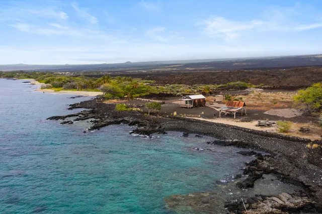 an aerial view of beach and ocean view