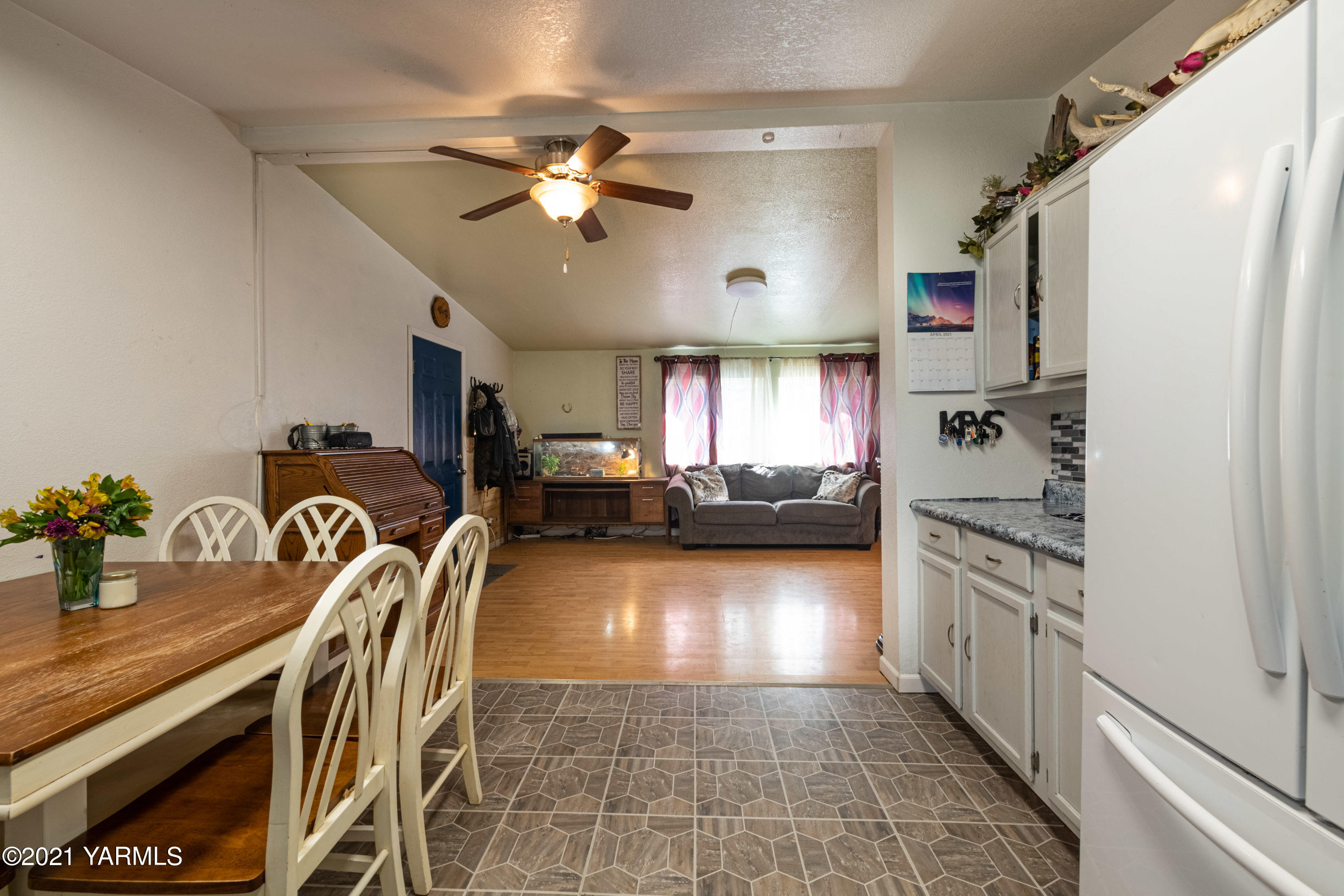 1222 Almo Road Yakima, WA 98901 - Photo 7 of 23 a kitchen with granite countertop a sink appliances cabinets and furniture